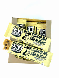 box of dark chocolate almond bars with bars sticking out, one is partially unwrapped